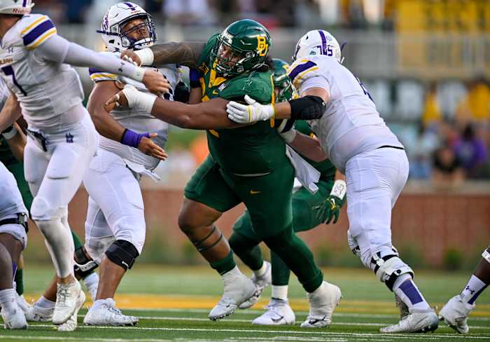 Baylor Bears defensive lineman Siaki Ika (62) in action during the game between the Baylor Bears and the Albany Great Danes at McLane Stadium.